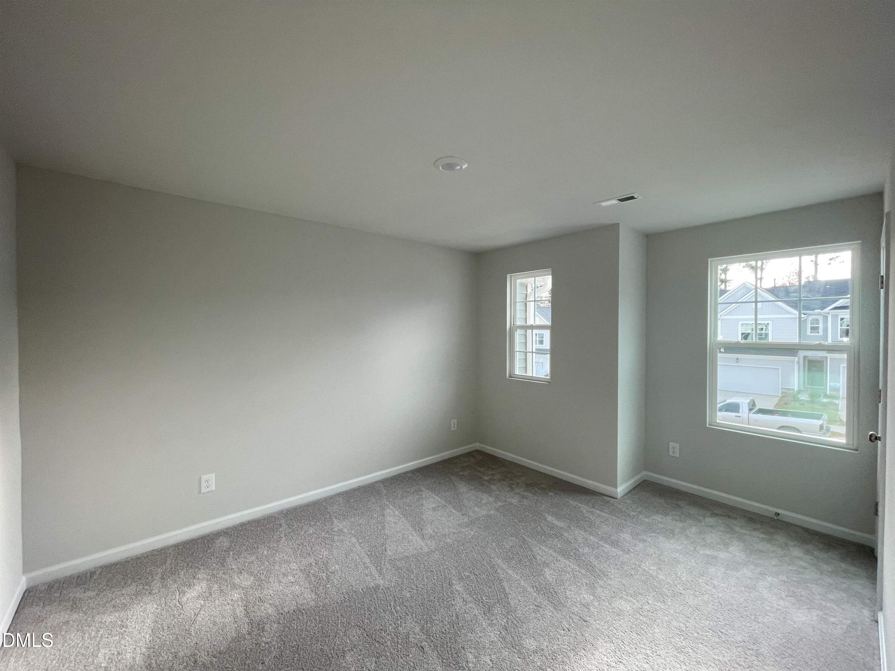 6525 Mezzo Lane Raleigh, NC 27616 - Photo 29 of 38 a view of an empty room with a window