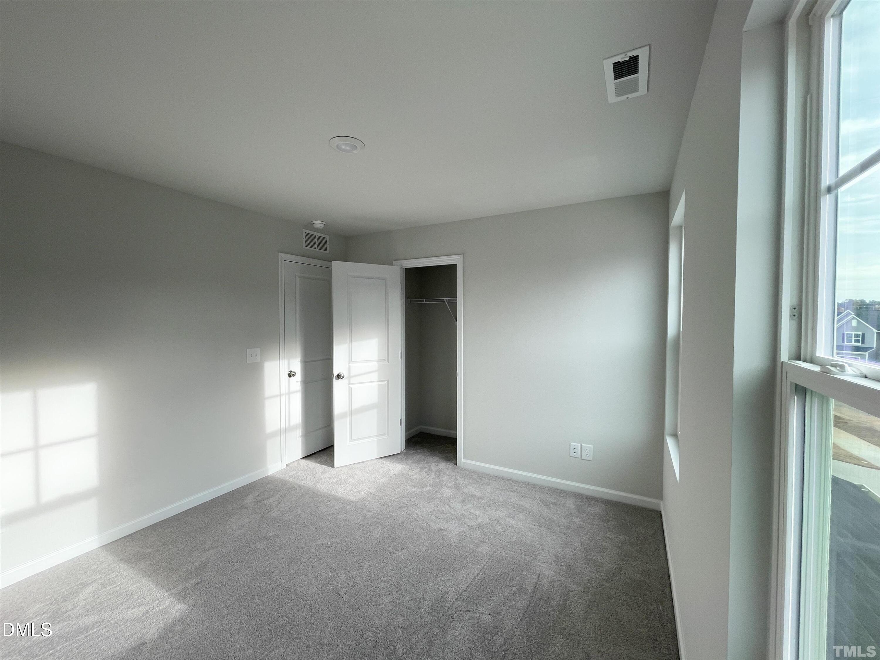 6525 Mezzo Lane Raleigh, NC 27616 - Photo 30 of 38 a view of an empty room with a window