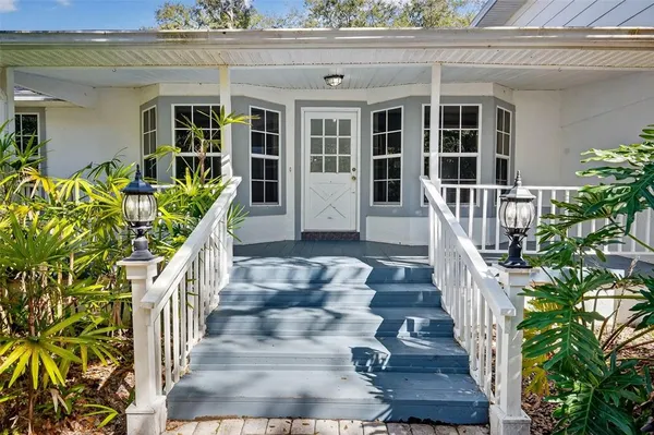 a view of front door and deck