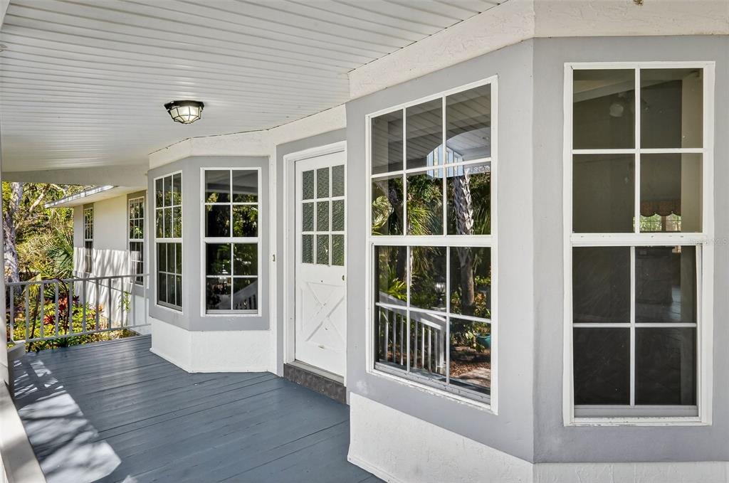 4875 Sailfish Drive Ponce Inlet, FL 32127 - Photo 3 of 60 a view of front door and deck
