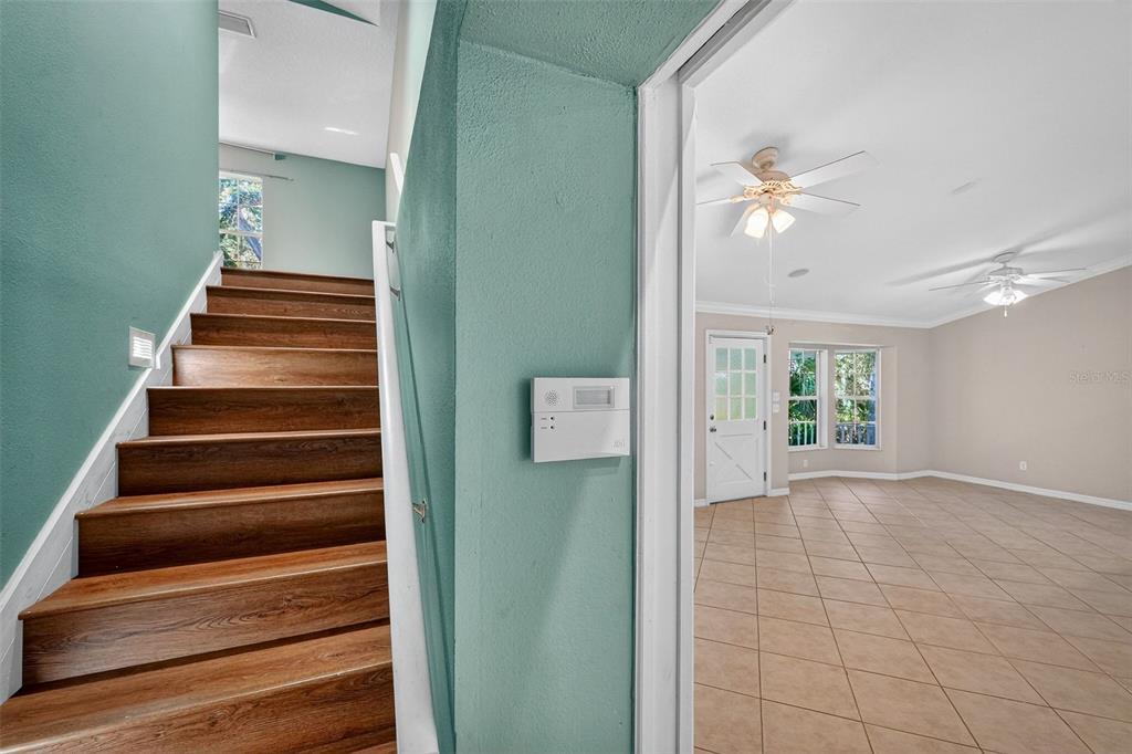 4875 Sailfish Drive Ponce Inlet, FL 32127 - Photo 35 of 60 a view of an entryway with wooden floor
