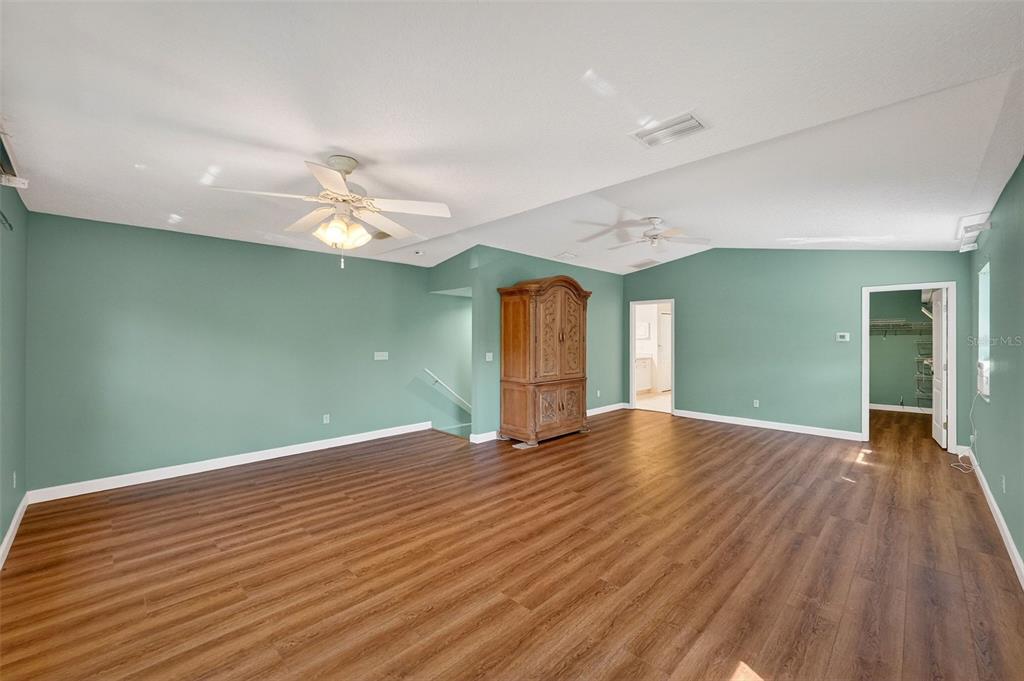 4875 Sailfish Drive Ponce Inlet, FL 32127 - Photo 38 of 60 wooden floor in an empty room with a window