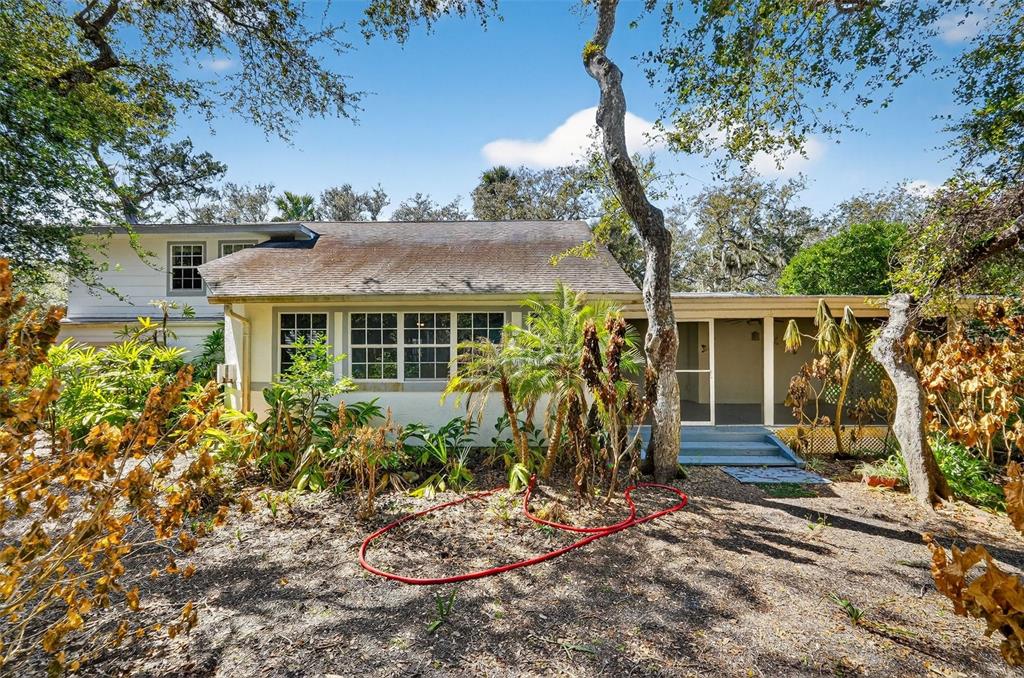 4875 Sailfish Drive Ponce Inlet, FL 32127 - Photo 50 of 60 front view of house with a yard