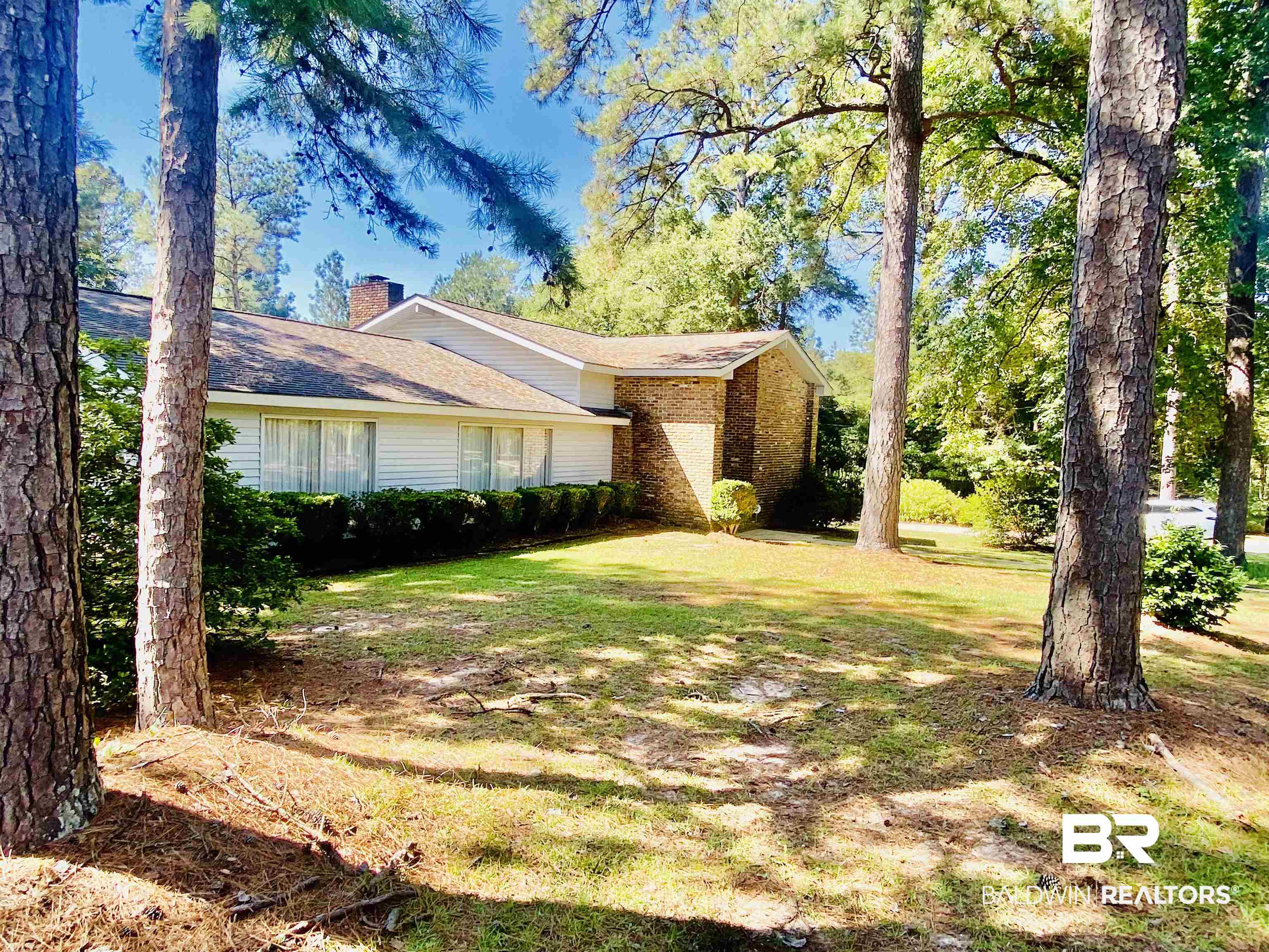 272 Longleaf Circle Monroeville, AL 36460 - Photo 37 of 38 Single story home with a front lawn.