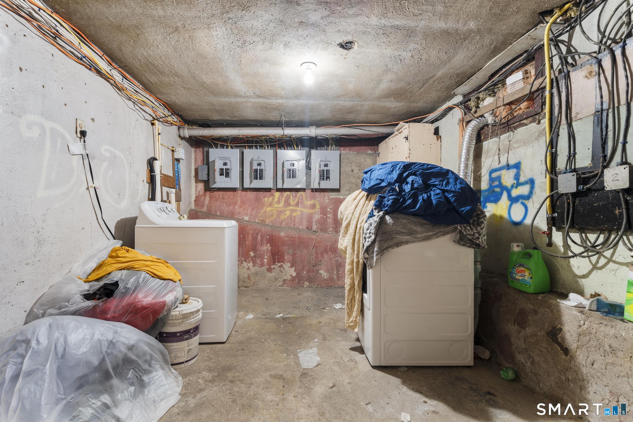 103 Walnut Street Waterbury, CT 06704 - Photo 38 of 38 a bed room with furniture and a window