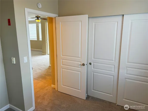 a view of a bathroom with a glass door