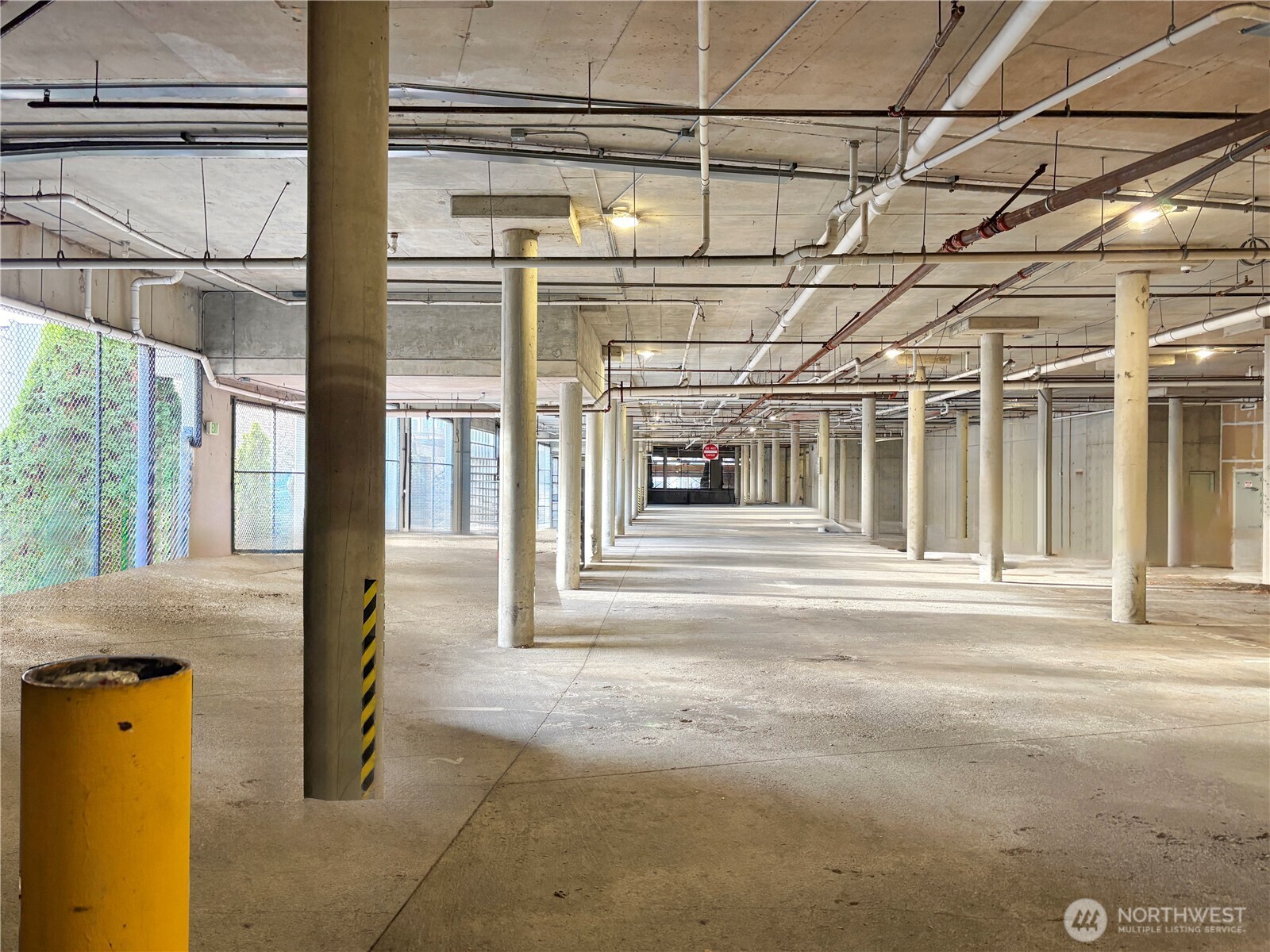 225 Logan Avenue South, Unit 111 Renton, WA 98057 - Photo 26 of 33 a front view of a house with a street