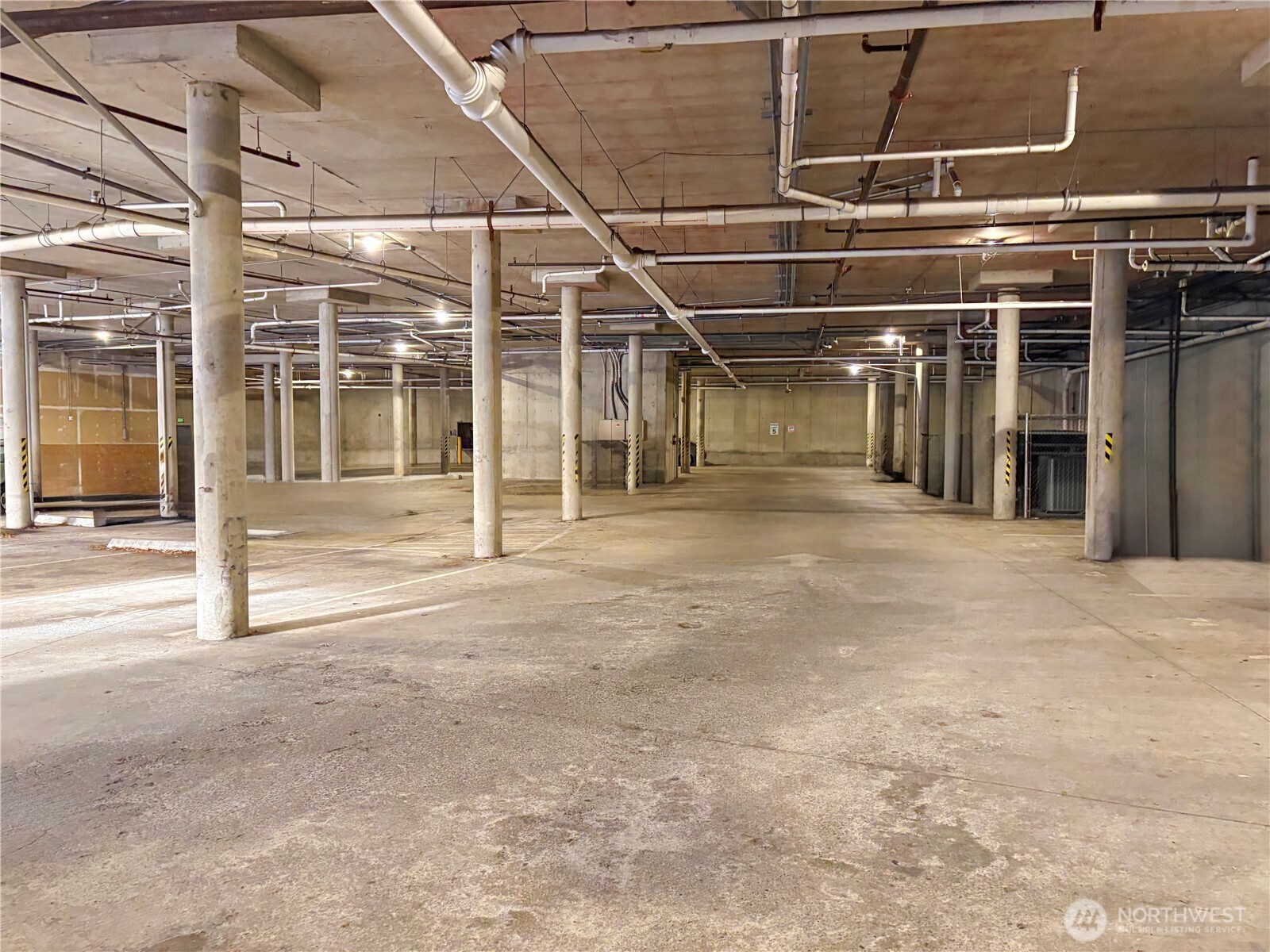 225 Logan Avenue South, Unit 111 Renton, WA 98057 - Photo 27 of 33 a view of a room with wooden floor