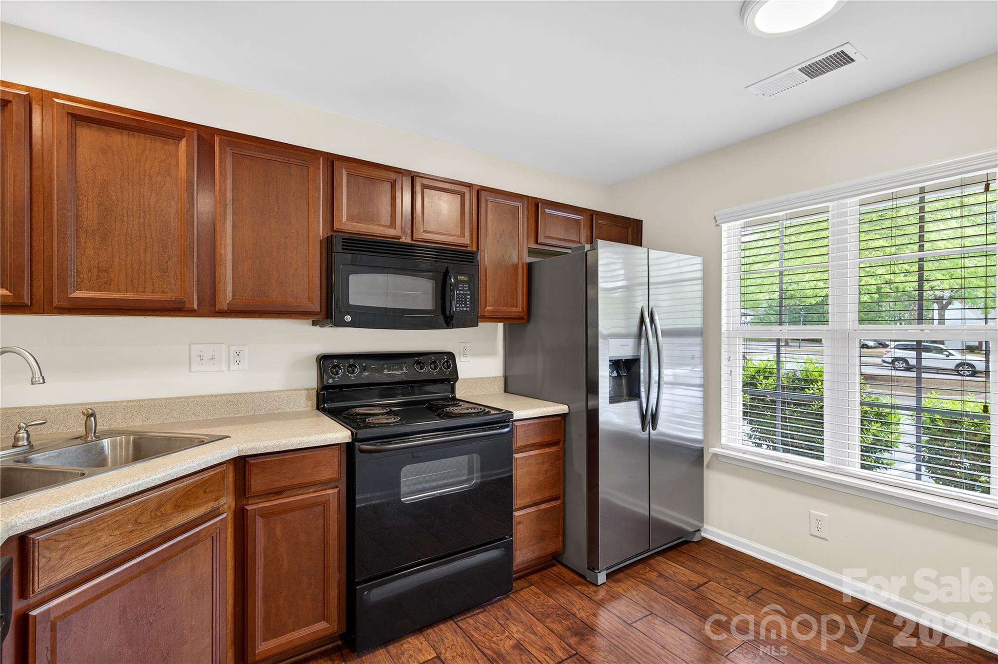 149 Marakery Road, Unit C Mooresville, NC 28115 - Photo 12 of 45 a kitchen with a refrigerator stove and sink