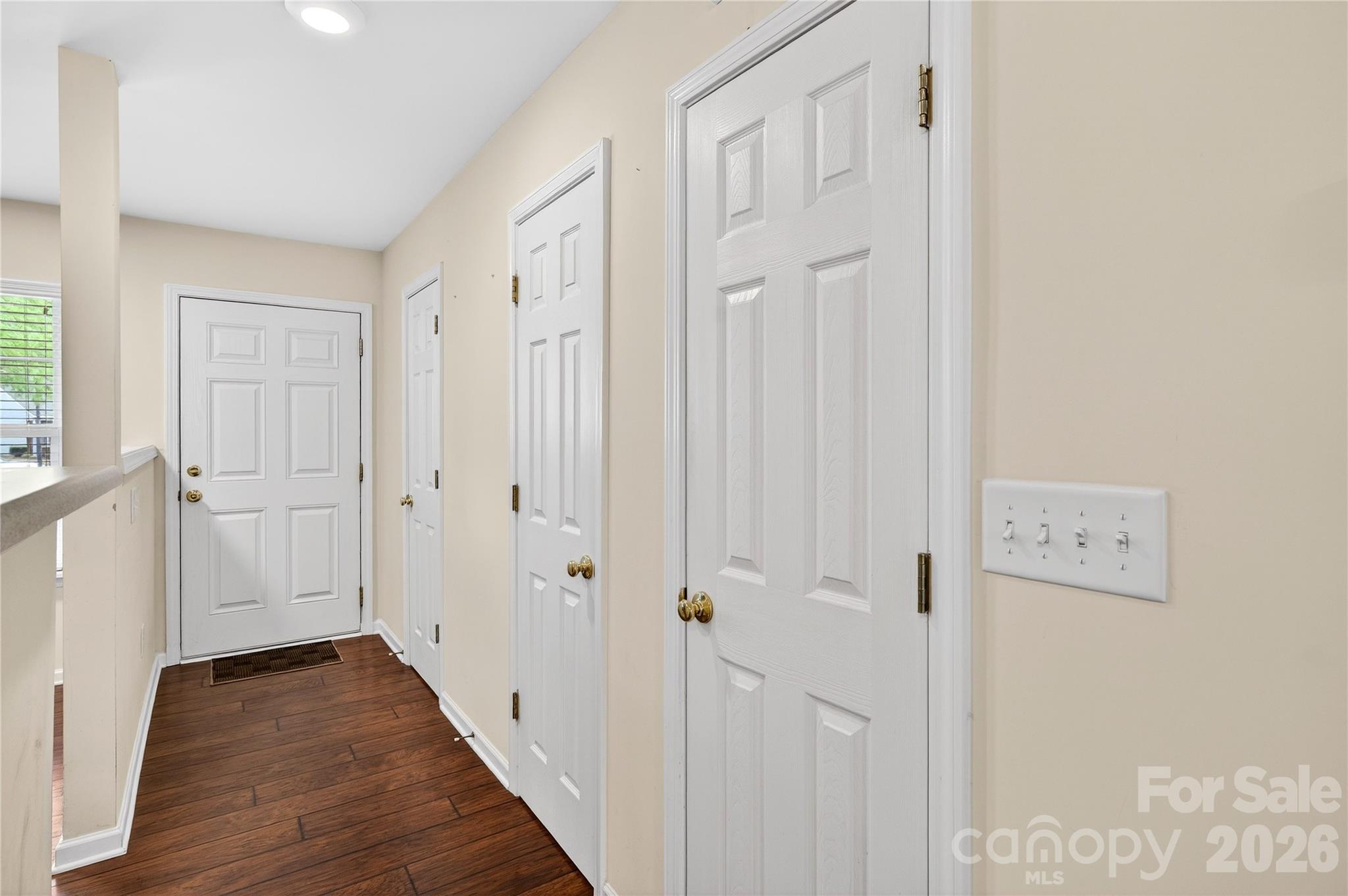 149 Marakery Road, Unit C Mooresville, NC 28115 - Photo 15 of 45 a view of a hallway with wooden floor