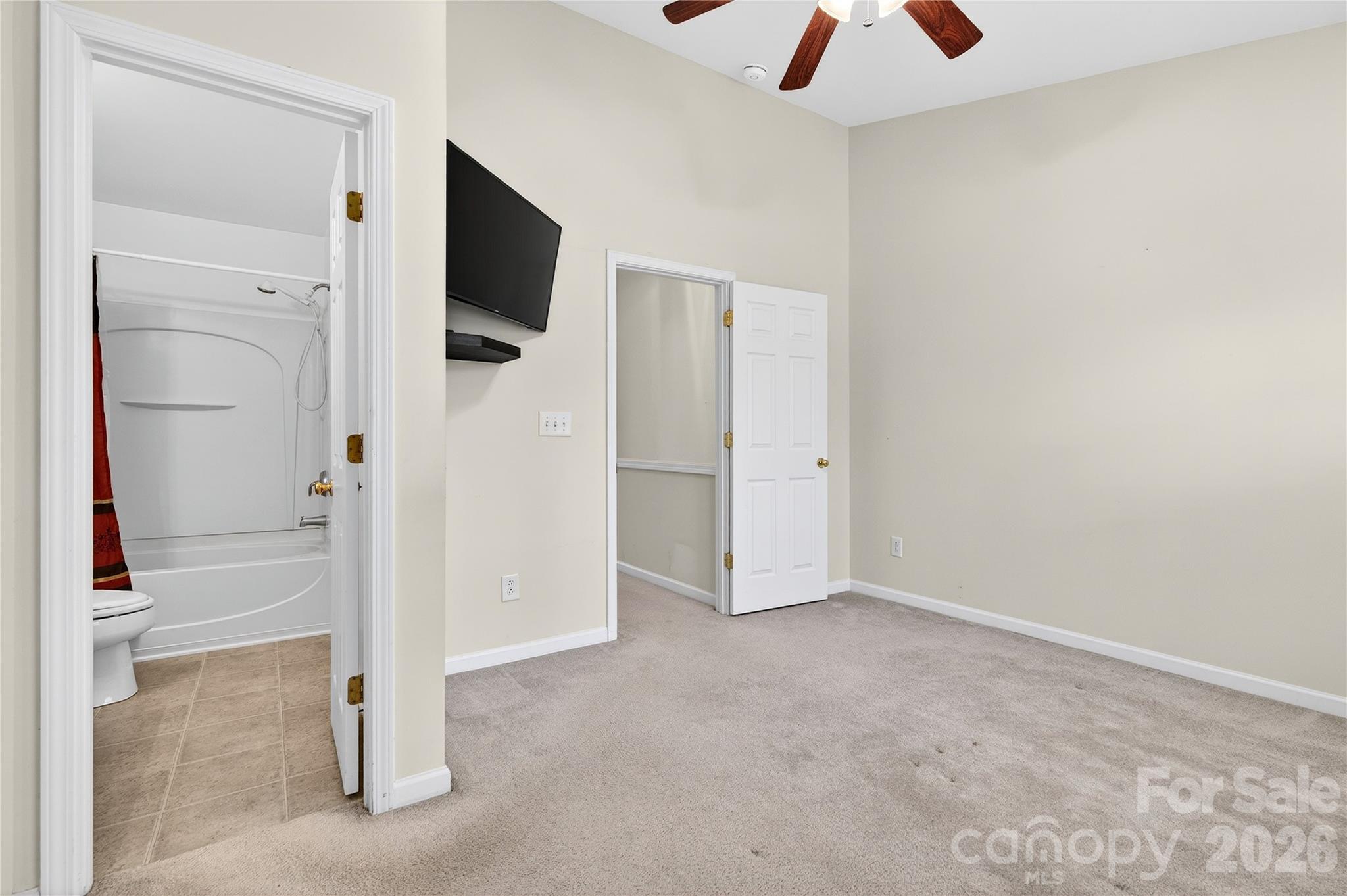 149 Marakery Road, Unit C Mooresville, NC 28115 - Photo 31 of 45 an empty room with closet and a chandelier fan