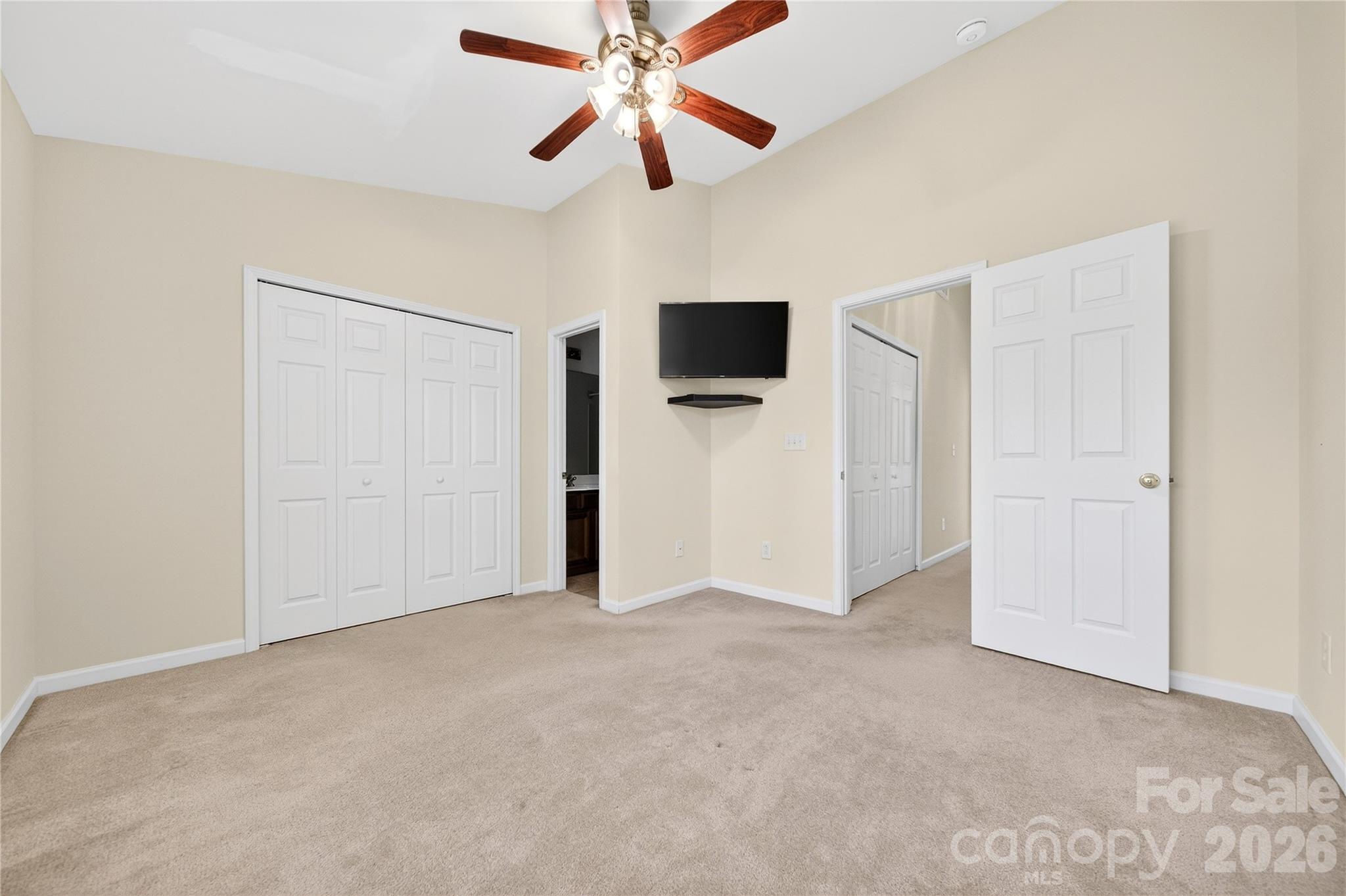 149 Marakery Road, Unit C Mooresville, NC 28115 - Photo 33 of 45 a view of a livingroom with a ceiling fan