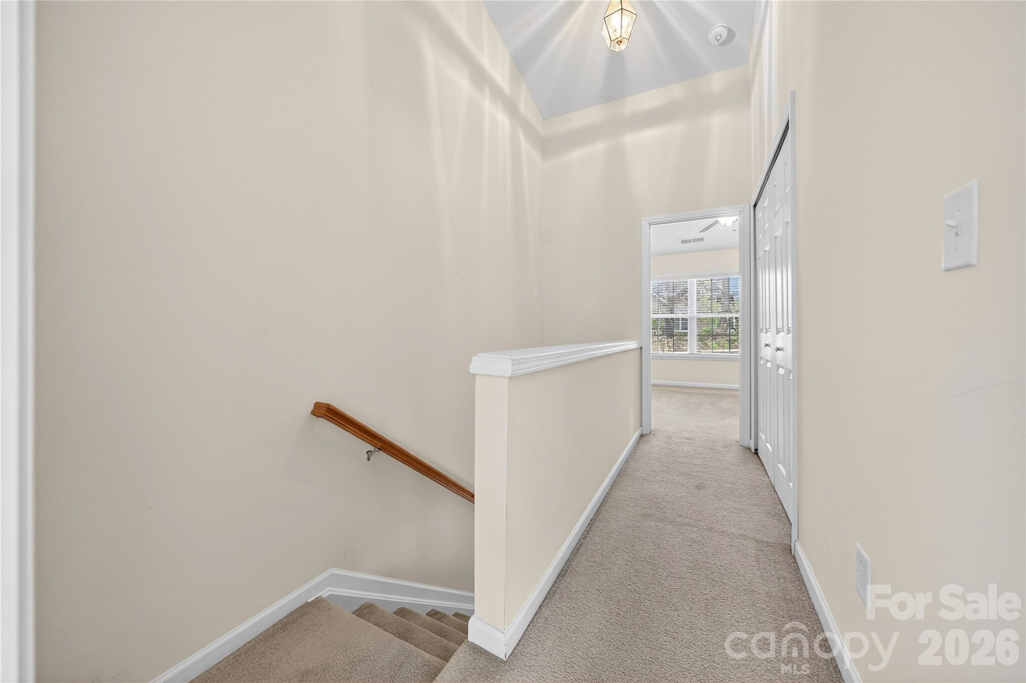 149 Marakery Road, Unit C Mooresville, NC 28115 - Photo 34 of 45 a view of a hallway with wooden floor