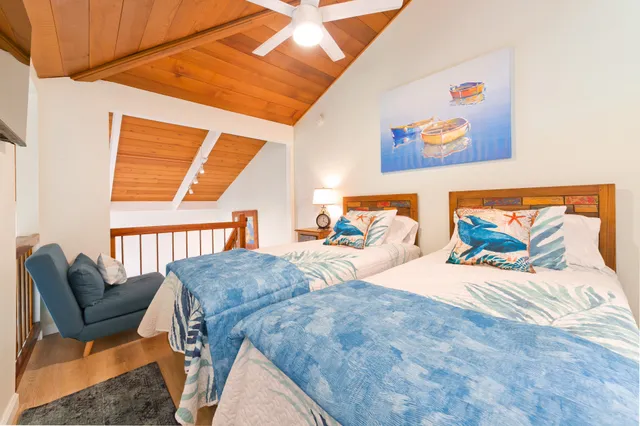 a bedroom with furniture and a bed