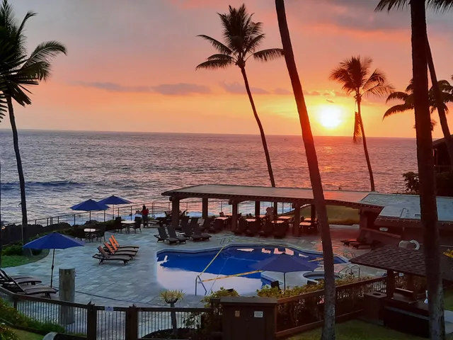 a view of swimming pool with seating area