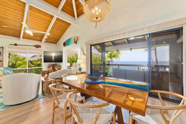 a dining room with a table and chairs