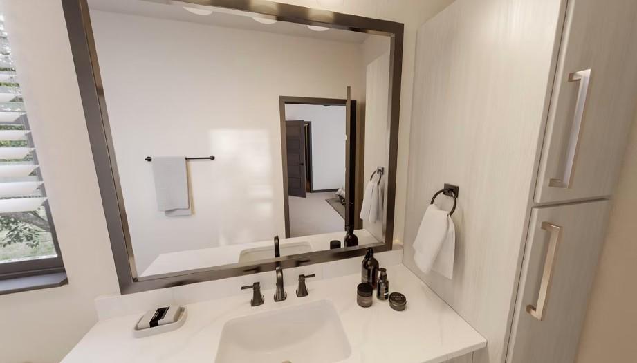 1881 2nd Avenue, Unit THD120 Decatur, GA 30032 - Photo 12 of 27 a bathroom with a sink and a mirror