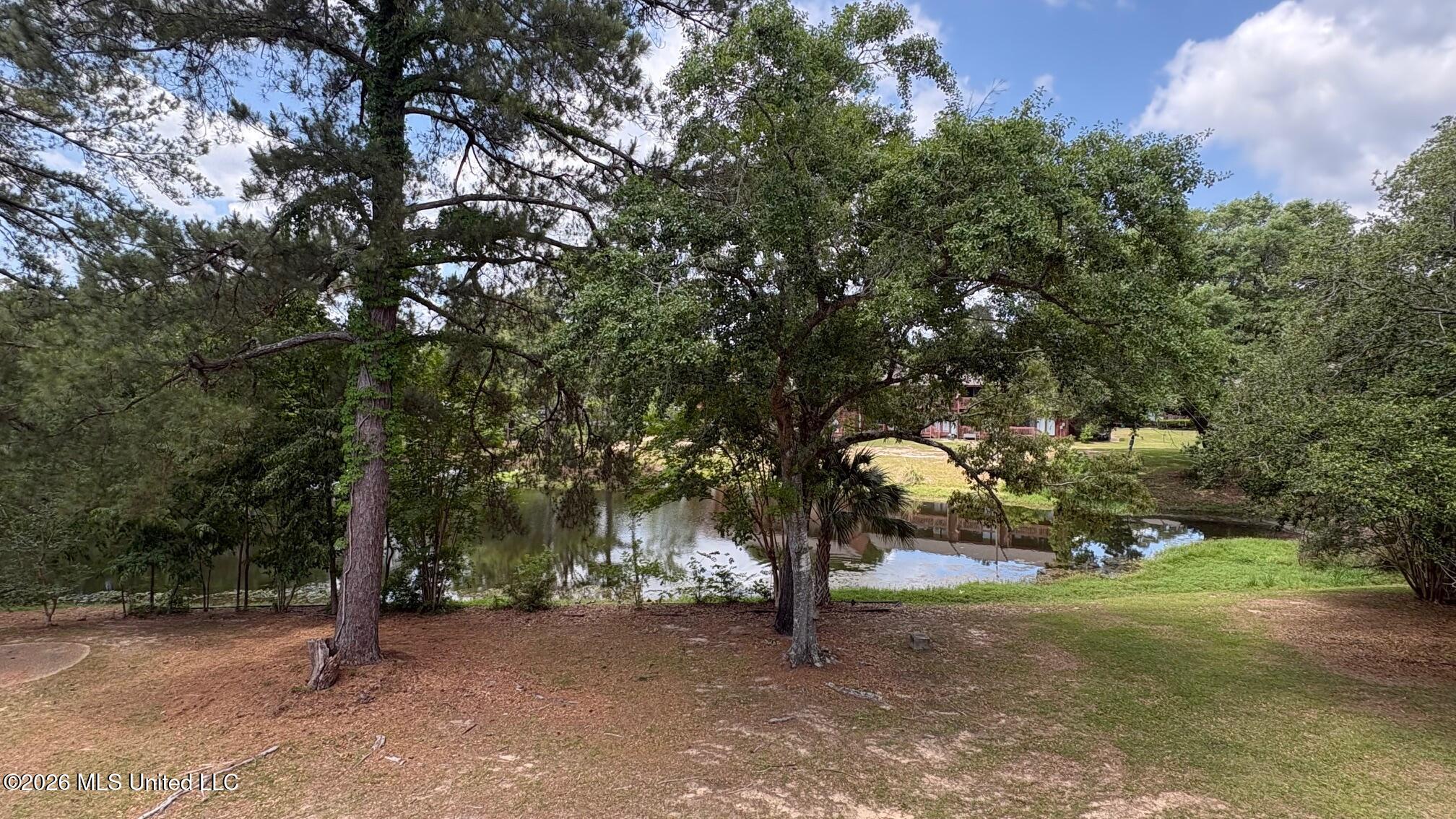 239 Lakeside Villa, Unit G Diamondhead, MS 39525 - Photo 7 of 9 IMG_1864