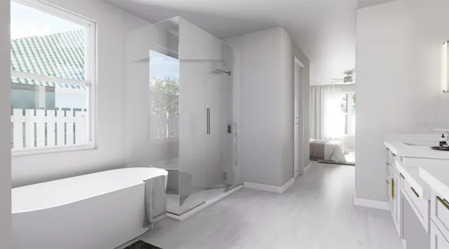 a bathroom with a sink a toilet and a tub