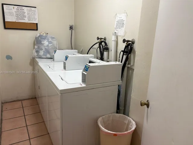 a view of a entryway and livingroom