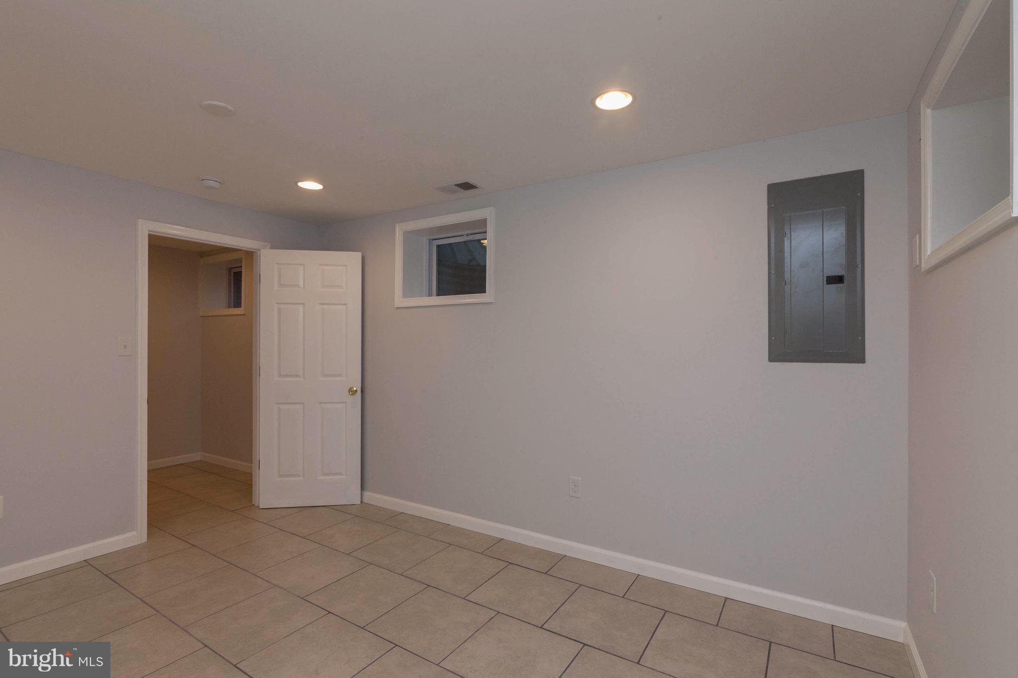 9107 Good Luck Road Lanham, MD 20706 - Photo 17 of 24 Basement Bedroom