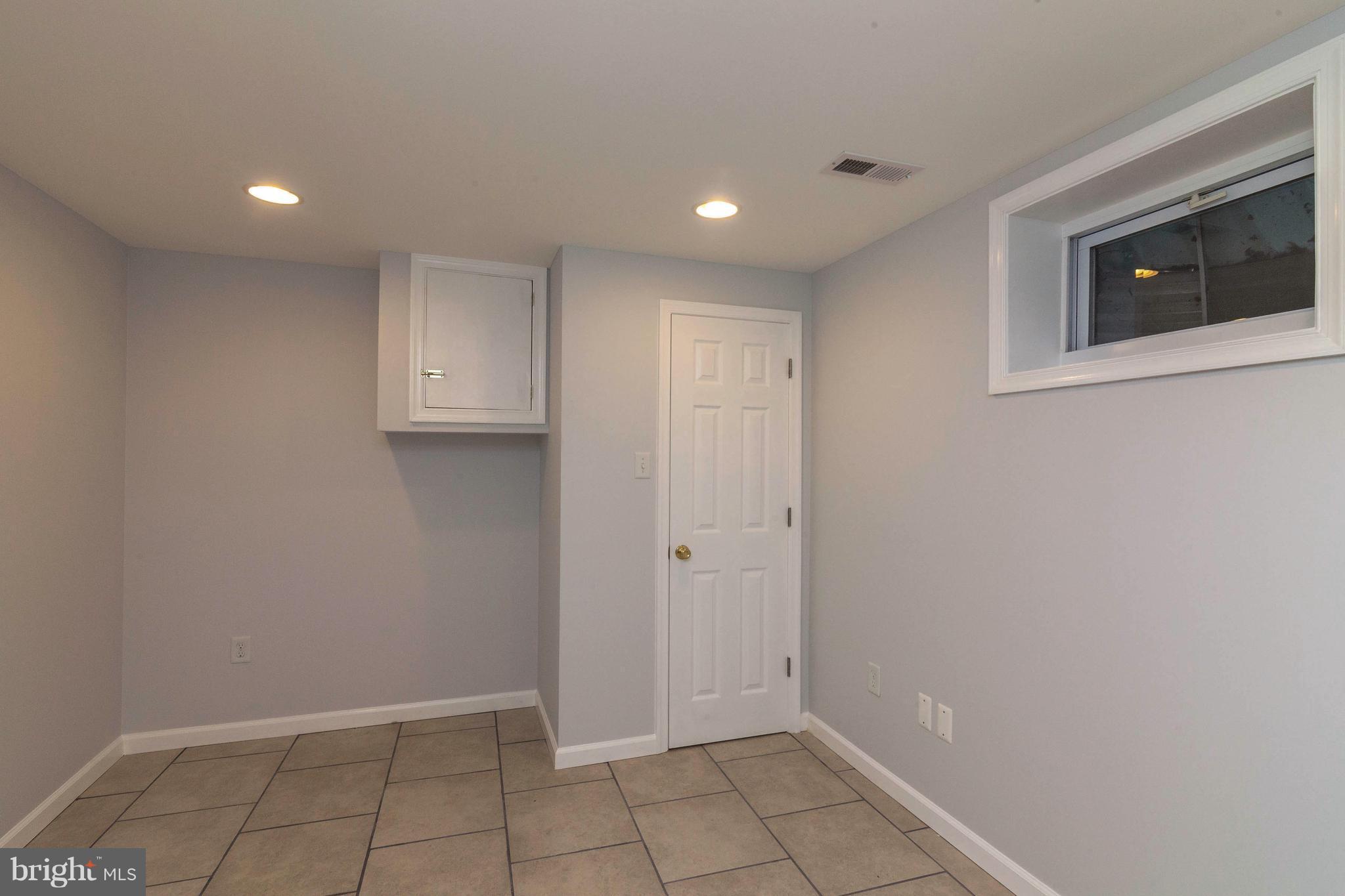 9107 Good Luck Road Lanham, MD 20706 - Photo 21 of 24 Basement Bedroom