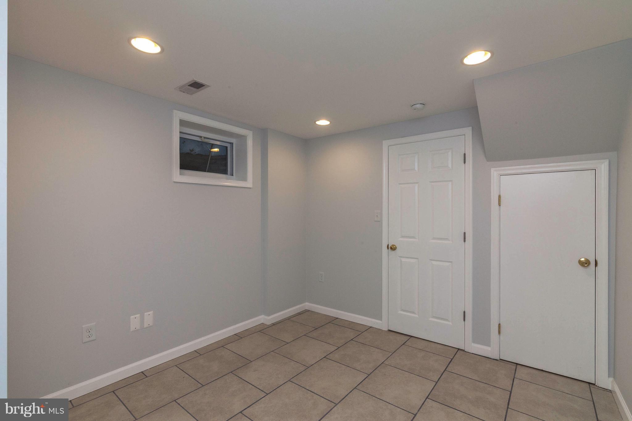 9107 Good Luck Road Lanham, MD 20706 - Photo 22 of 24 Basement Bedroom