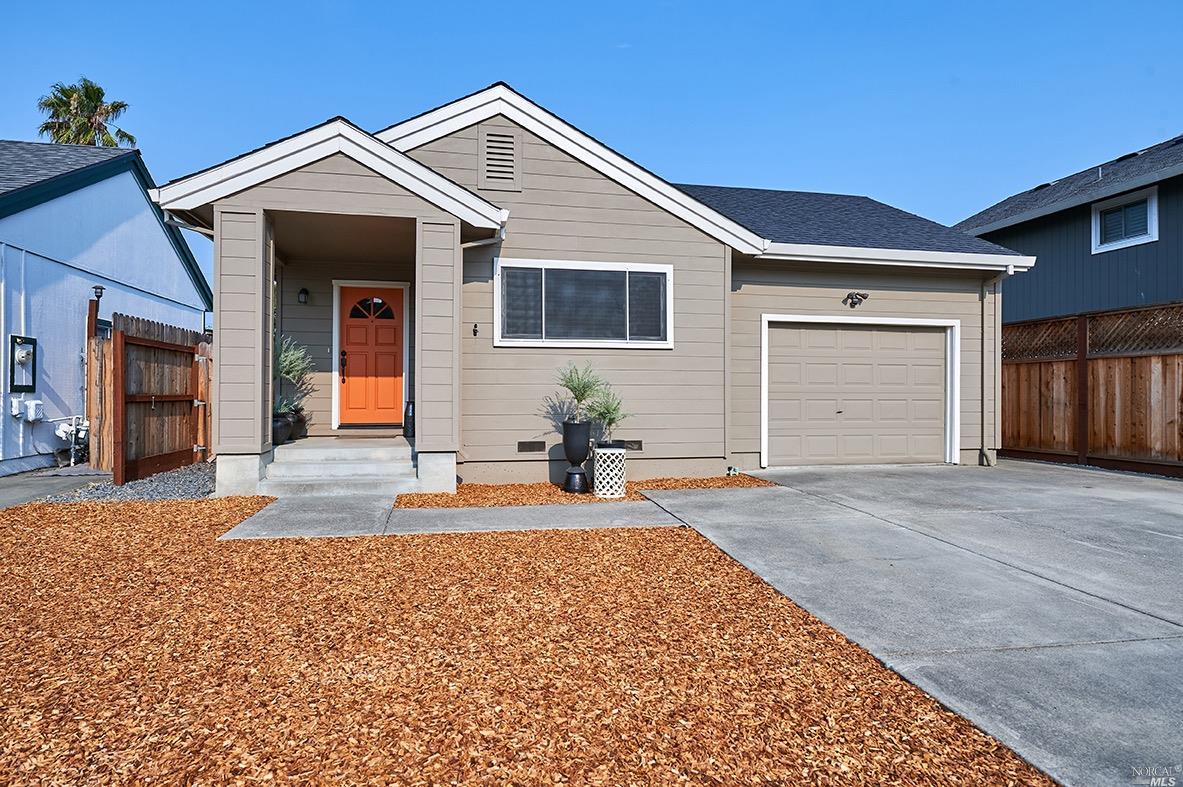 2156 Bock Street Santa Rosa, CA 95403 - Photo 1 of 1 a front view of a house with a yard