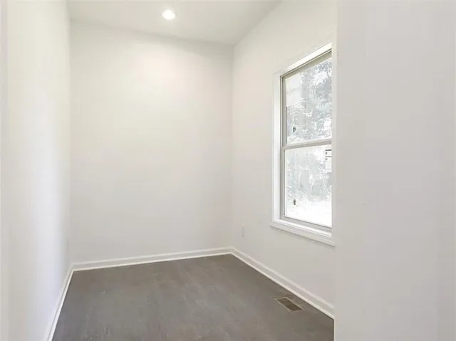 an empty room with a window