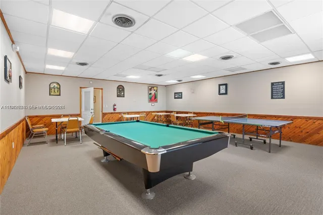 a view of a room with window and furniture