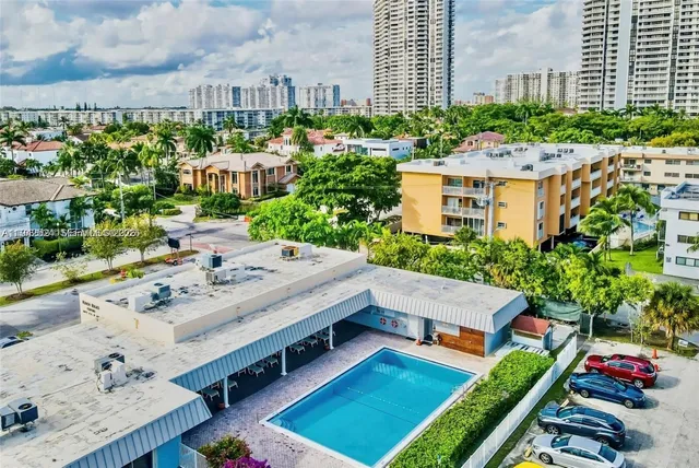 a view of a house with a swimming pool
