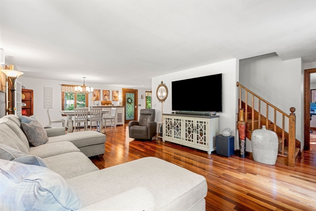 115 Depot Road Boxford, MA 01921 - Photo 13 of 40 a living room with furniture and a flat screen tv