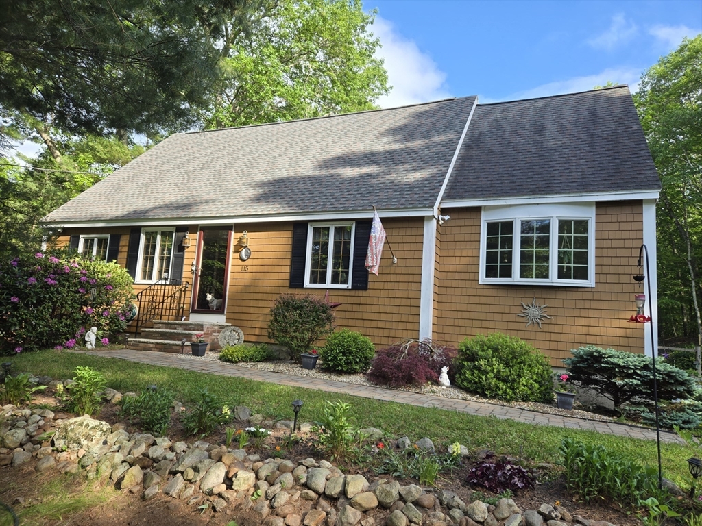 115 Depot Road Boxford, MA 01921 - Photo 2 of 40 a view of a house with a yard and plants