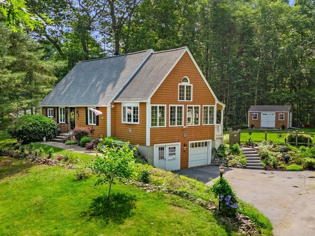 115 Depot Road Boxford, MA 01921 - Photo 3 of 40 a front view of a house with a yard