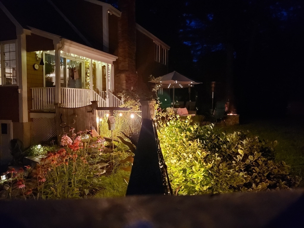 115 Depot Road Boxford, MA 01921 - Photo 35 of 40 a view of a flower in front of house