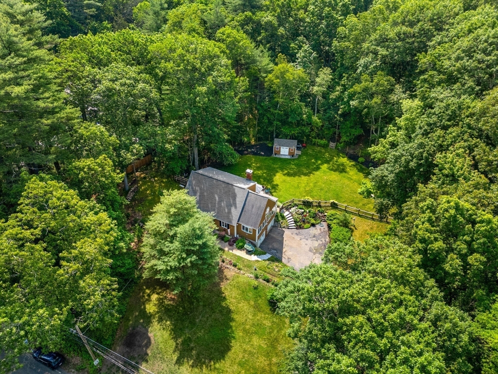 115 Depot Road Boxford, MA 01921 - Photo 5 of 40 a view of a back yard from a fountain