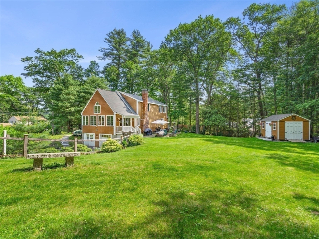 115 Depot Road Boxford, MA 01921 - Photo 6 of 40 a front view of a house with garden