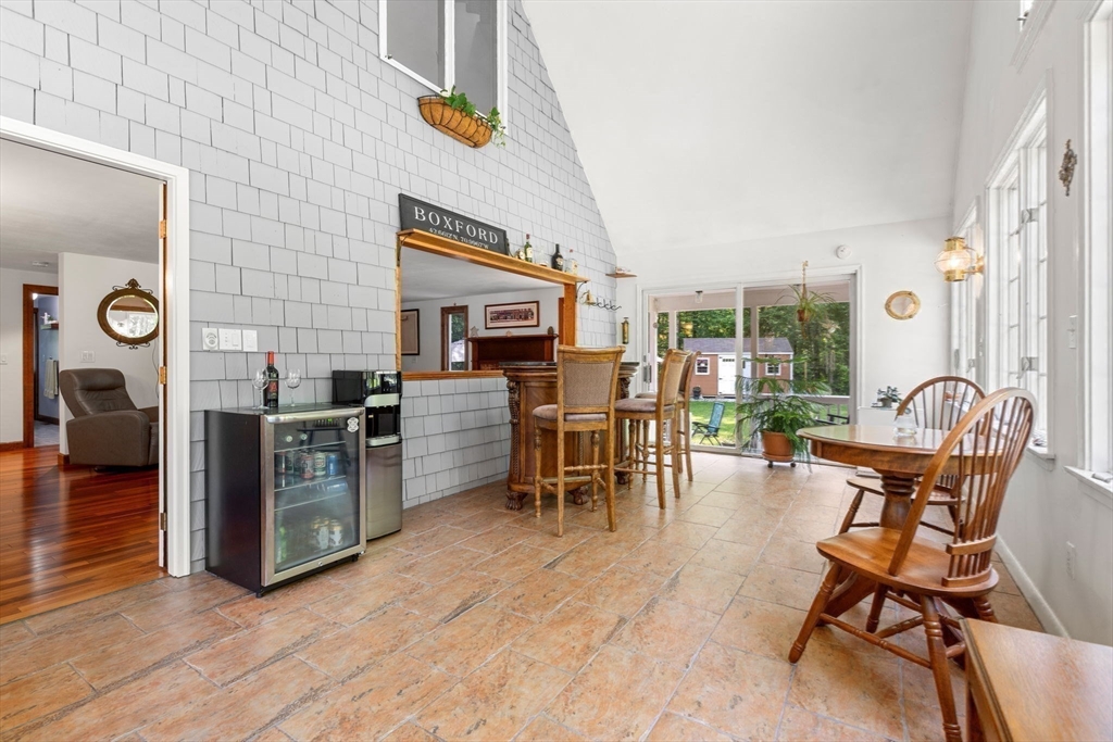 115 Depot Road Boxford, MA 01921 - Photo 8 of 40 a dining room with furniture and wooden floor