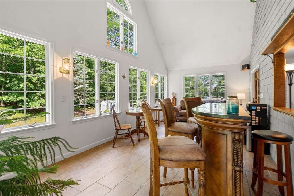 115 Depot Road Boxford, MA 01921 - Photo 10 of 40 a living room with furniture and floor to ceiling windows
