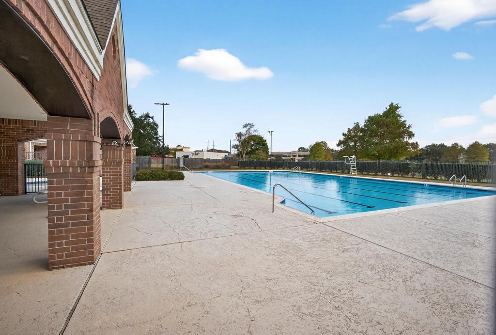 8815 Stoney Bend Drive Spring, TX 77379 - Photo 37 of 50 Take a dip in the pool on a hot
summer day.