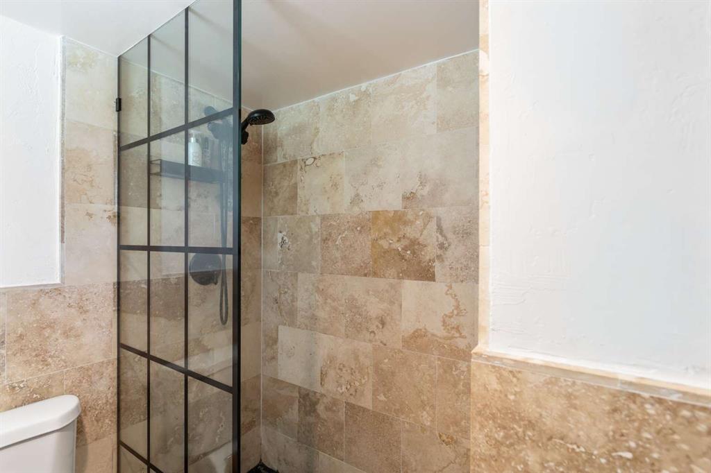 651 Northeast 60th Street, Unit 22 Miami, FL 33137 - Photo 8 of 12 a bathroom with a shower