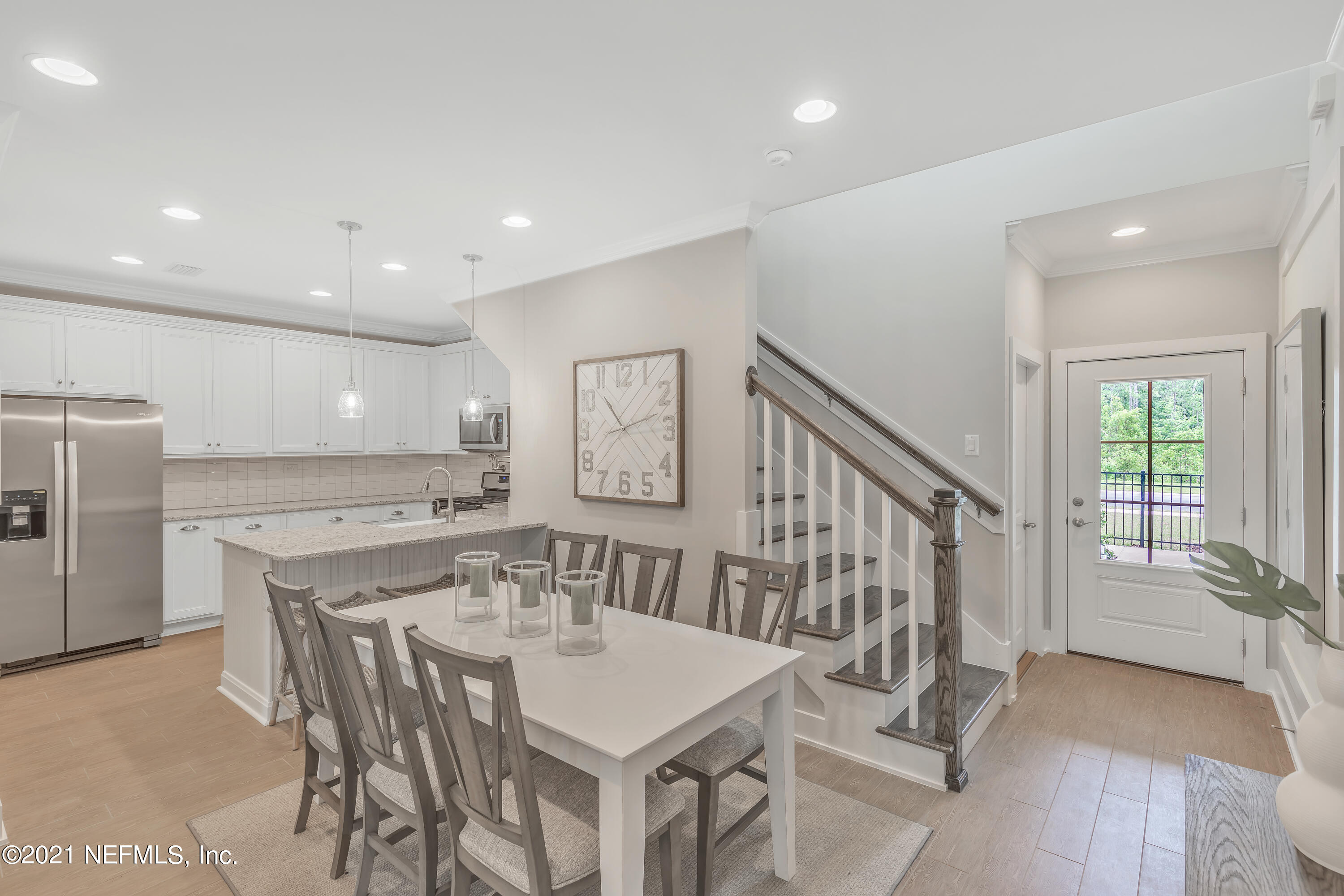 236 Charlie Way St. Augustine, FL 32095 - Photo 4 of 24 a view of a dining room with furniture and a table