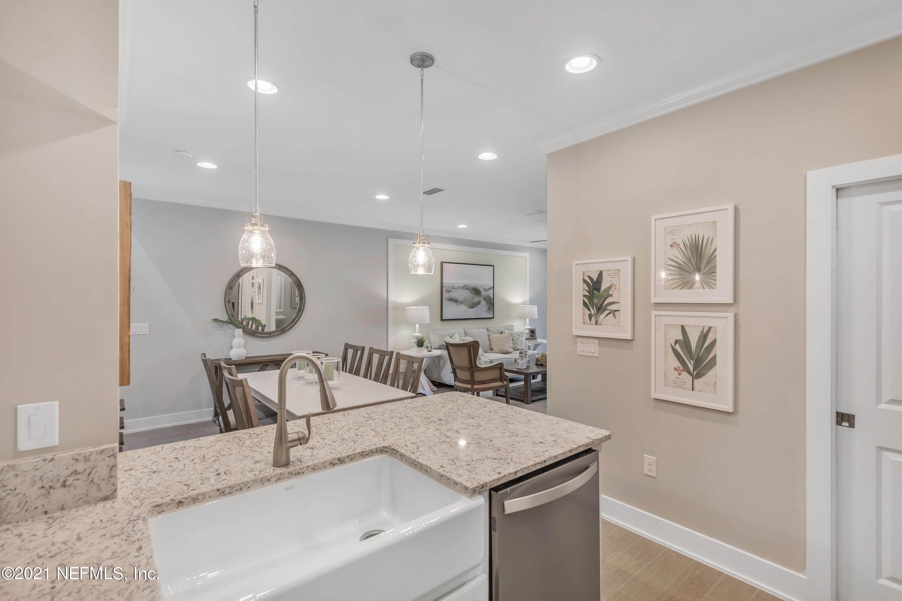 236 Charlie Way St. Augustine, FL 32095 - Photo 6 of 24 a view of a room with shelves