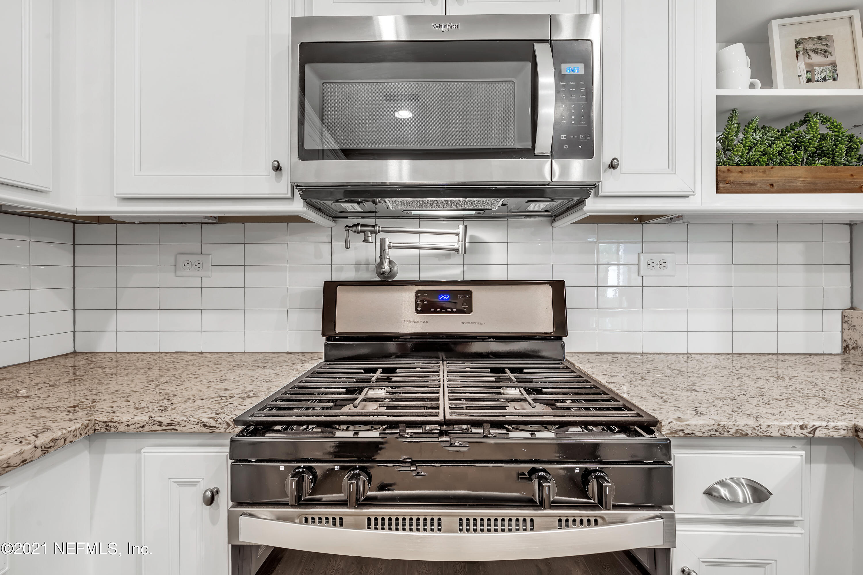 236 Charlie Way St. Augustine, FL 32095 - Photo 7 of 24 a stove top oven sitting inside of a kitchen