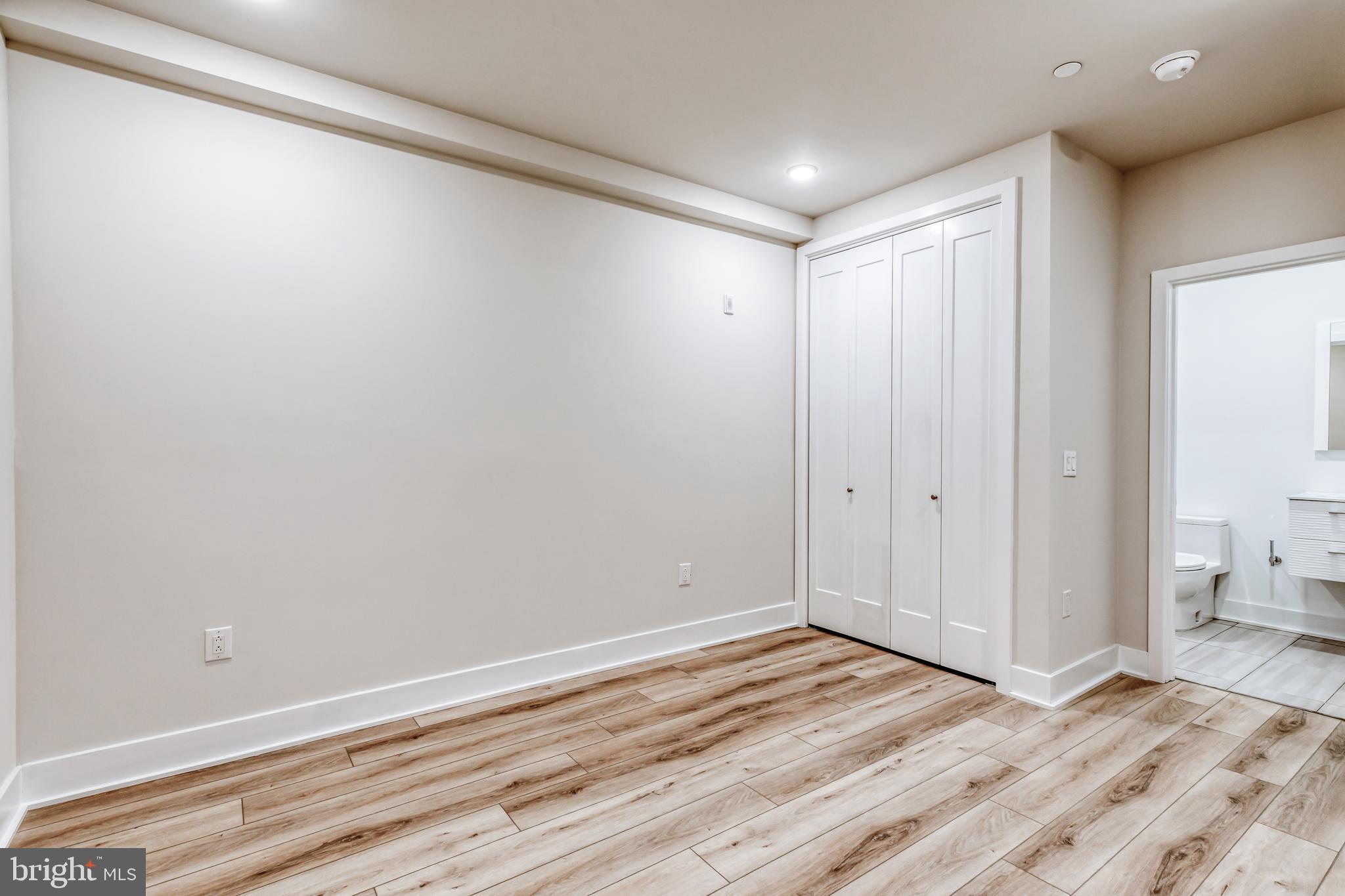 1506 North 8th Street, Unit 1 Philadelphia, PA 19122 - Photo 7 of 18 a view of a room with wooden floor
