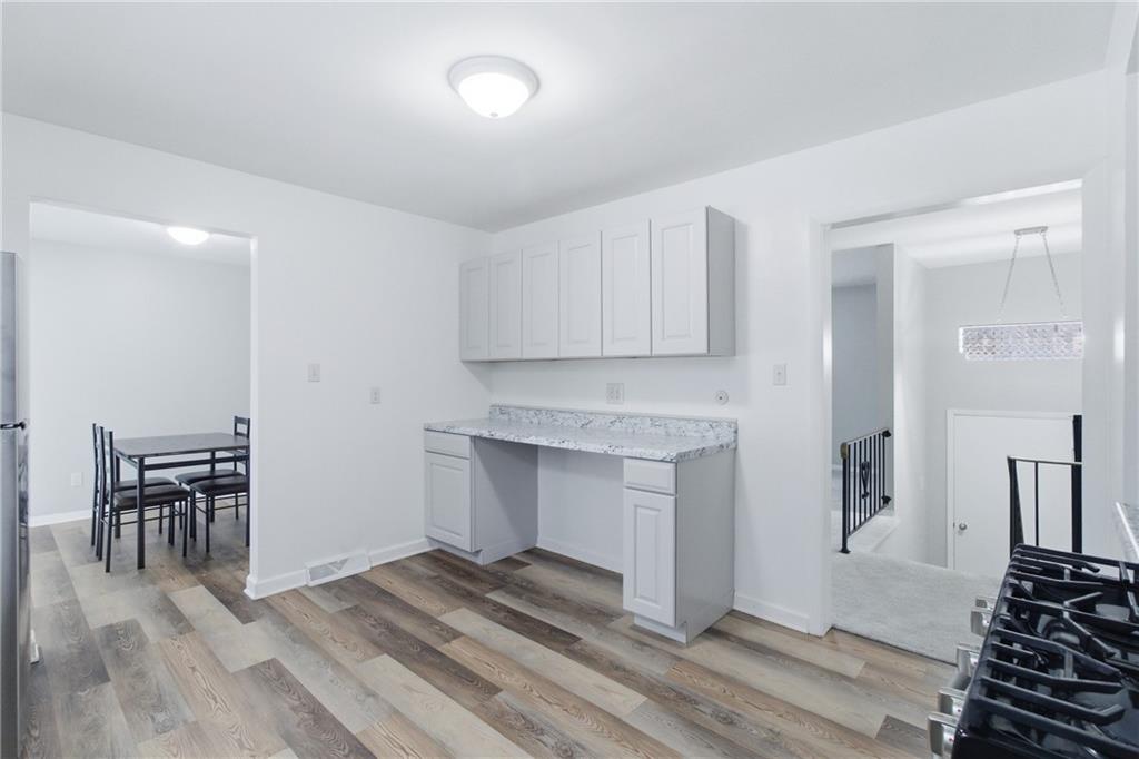 185 Sunset Drive Indiana, PA 15701 - Photo 13 of 29 a view of kitchen with furniture and wooden floor