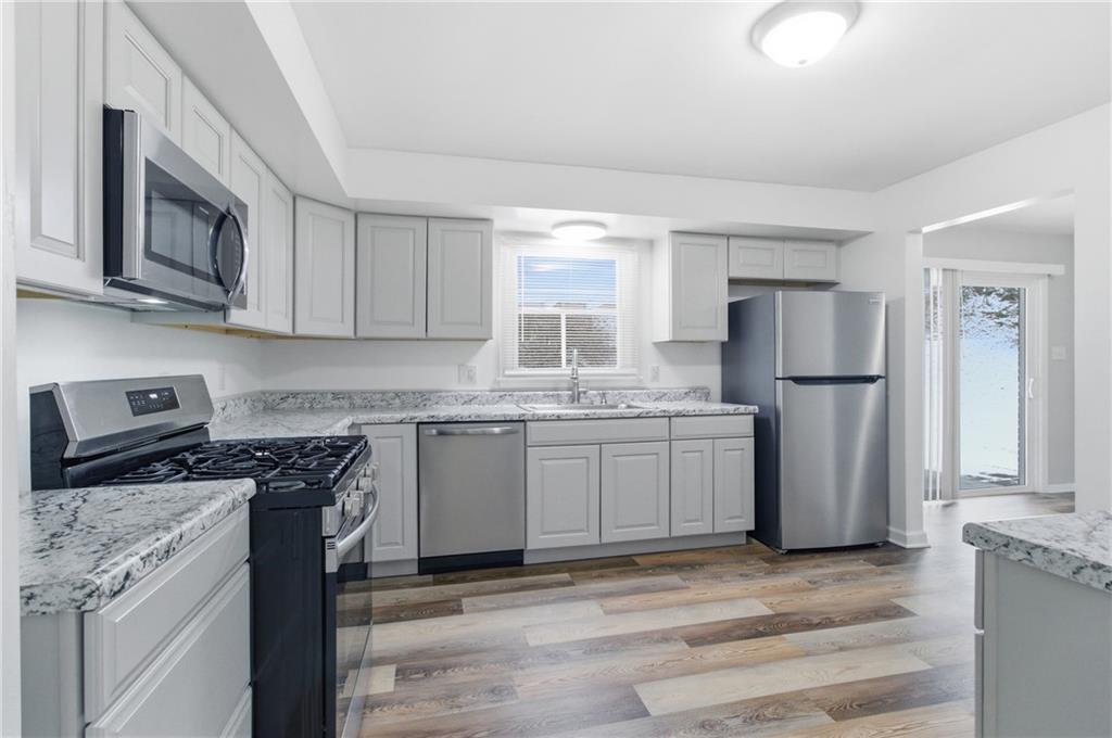 185 Sunset Drive Indiana, PA 15701 - Photo 14 of 29 a kitchen with stainless steel appliances granite countertop a refrigerator sink and stove