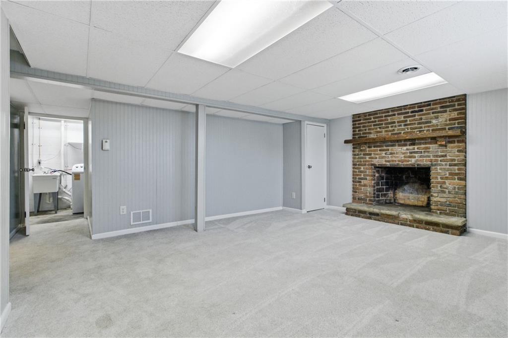 185 Sunset Drive Indiana, PA 15701 - Photo 24 of 29 an empty room with furniture and a fireplace