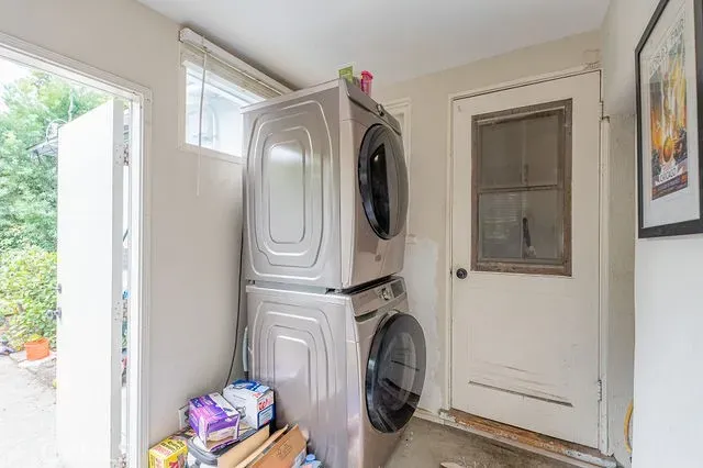 a kitchen with a stove and a sink