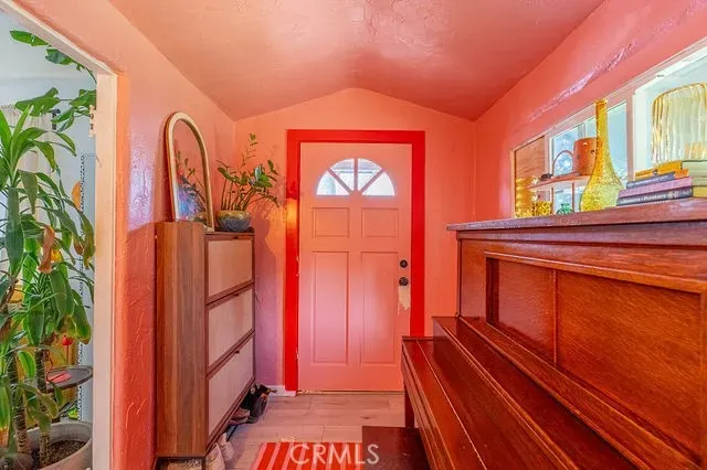 an aerial view of a residential apartment building with yard